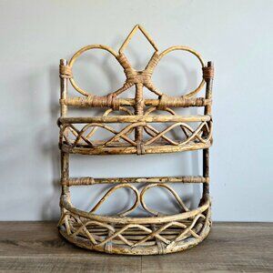 Vintage midcentury ratan wicker shelf.